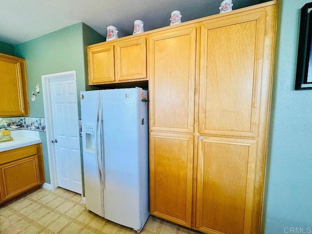 1670 Hillsborough St, Chula Vista, CA 91913 - kitchen featuring white refrigerator with ice dispenser and light flooring