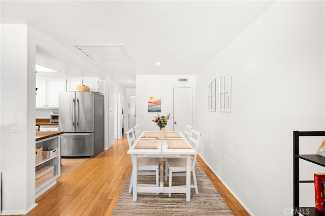 1105 W Calle De La Luna Unit 4, Azusa, CA 91702 - dining space with light wood-style floors and recessed lighting