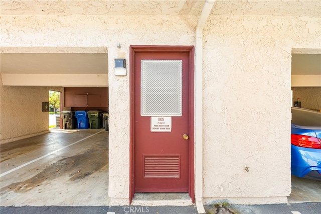1105 W Calle De La Luna Unit 4, Azusa, CA 91702 - doorway to property featuring stucco siding