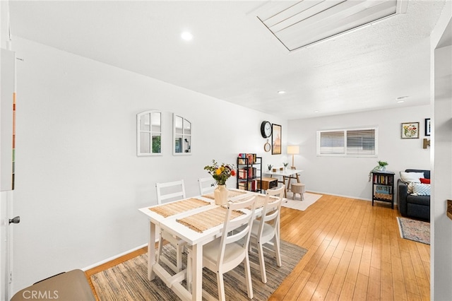 1105 W Calle De La Luna Unit 4, Azusa, CA 91702 - dining area with light wood-style flooring and recessed lighting