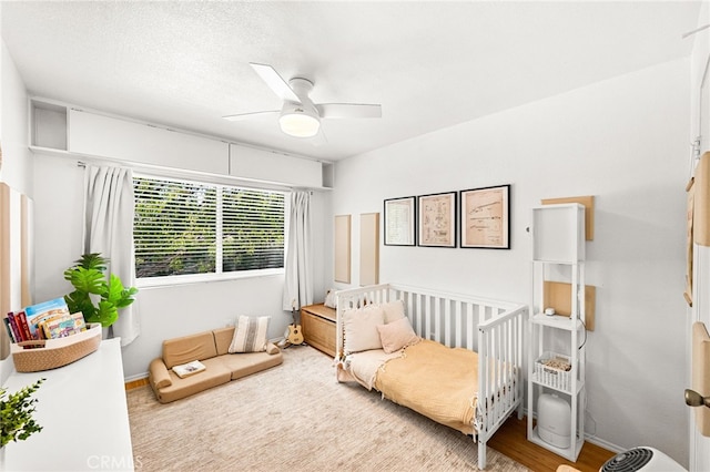 1105 W Calle De La Luna Unit 4, Azusa, CA 91702 - bedroom featuring wood finished floors and ceiling fan
