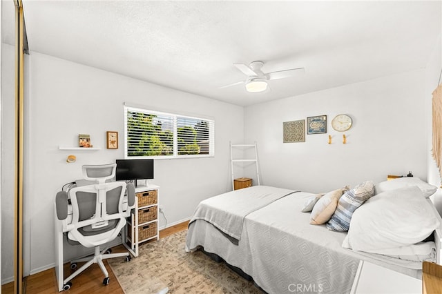 1105 W Calle De La Luna Unit 4, Azusa, CA 91702 - bedroom featuring wood finished floors and a ceiling fan