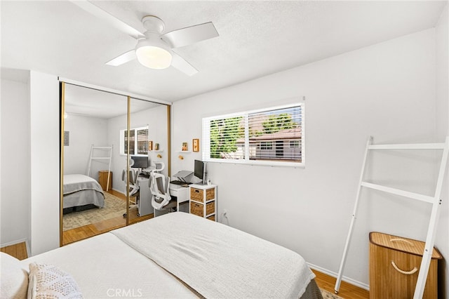 1105 W Calle De La Luna Unit 4, Azusa, CA 91702 - bedroom featuring wood finished floors, a closet, and a ceiling fan