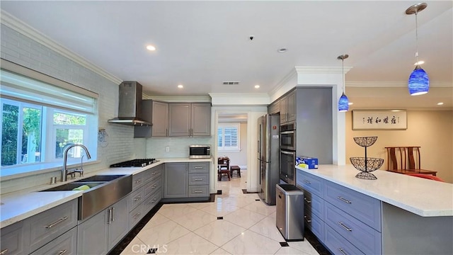 1018 Palm Ave, San Gabriel, CA 91776 - kitchen featuring wall chimney range hood, gray cabinetry, stainless steel appliances, ornamental molding, and a peninsula