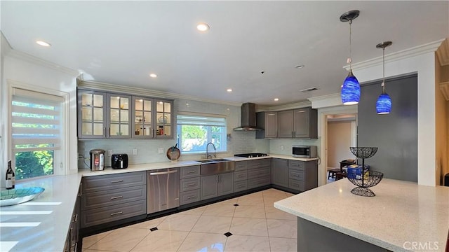 1018 Palm Ave, San Gabriel, CA 91776 - kitchen with stainless steel appliances, wall chimney range hood, gray cabinets, tasteful backsplash, and ornamental molding