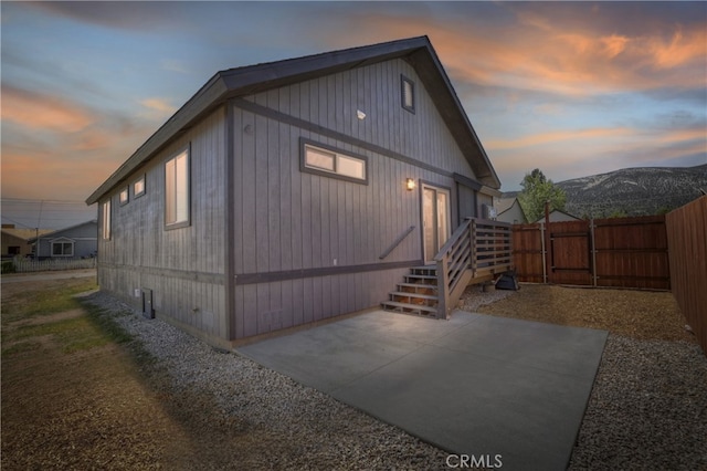 2217 Juniper Ln, Big Bear City, CA 92314 - view of side of property with a gate and a patio area