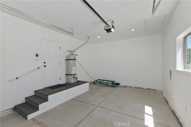 2217 Juniper Ln, Big Bear City, CA 92314 - garage with secured water heater, a garage door opener, and recessed lighting