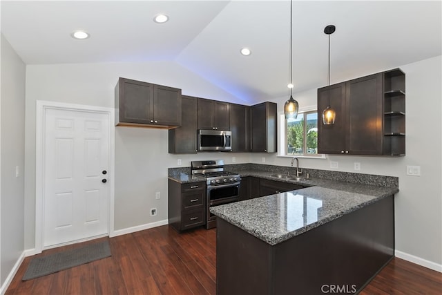 2217 Juniper Ln, Big Bear City, CA 92314 - kitchen featuring appliances with stainless steel finishes, lofted ceiling, a peninsula, dark stone counters, and dark brown cabinetry