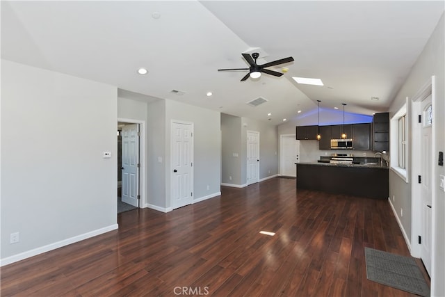 2217 Juniper Ln, Big Bear City, CA 92314 - unfurnished living room featuring lofted ceiling, a ceiling fan, a skylight, dark wood-style flooring, and recessed lighting