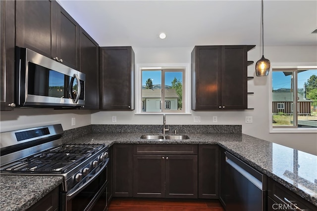 2217 Juniper Ln, Big Bear City, CA 92314 - kitchen featuring stainless steel appliances, dark stone counters, dark wood finished floors, recessed lighting, and dark brown cabinets