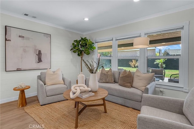 3531 Josie Ave, Long Beach, CA 90808 - living area featuring light wood finished floors, ornamental molding, and recessed lighting
