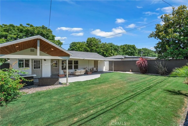 3531 Josie Ave, Long Beach, CA 90808 - back of property featuring a yard and a patio area