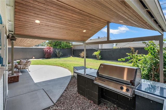 3531 Josie Ave, Long Beach, CA 90808 - fenced backyard featuring a patio area and grilling area