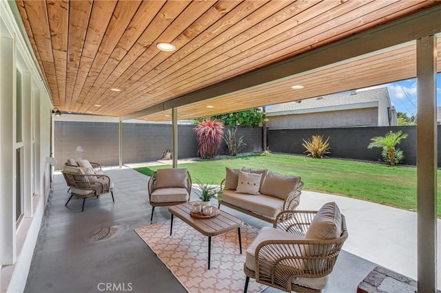 3531 Josie Ave, Long Beach, CA 90808 - fenced backyard featuring an outdoor hangout area and a patio
