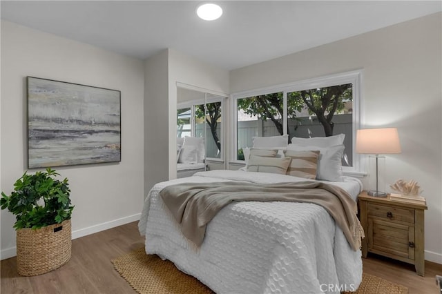 3531 Josie Ave, Long Beach, CA 90808 - bedroom featuring baseboards and wood finished floors
