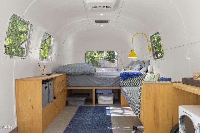 4530 Hendrickson Rd, Ojai, CA 93023 - bedroom featuring lofted ceiling and washer / dryer