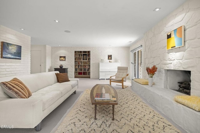 4530 Hendrickson Rd, Ojai, CA 93023 - carpeted living area featuring a stone fireplace and recessed lighting