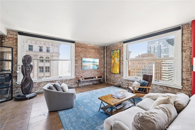 215 W 7th St Unit 1108, Los Angeles, CA 90014 - tiled living area featuring brick wall and healthy amount of natural light