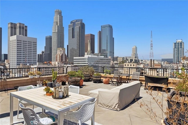 215 W 7th St Unit 1108, Los Angeles, CA 90014 - view of patio / terrace featuring a skyline view and outdoor dining space