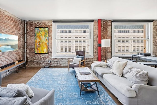 215 W 7th St Unit 1108, Los Angeles, CA 90014 - living area featuring brick wall and wood finished floors