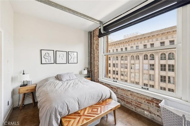215 W 7th St Unit 1108, Los Angeles, CA 90014 - bedroom with brick wall and tile patterned floors