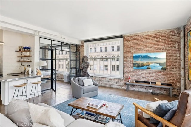 215 W 7th St Unit 1108, Los Angeles, CA 90014 - living room featuring brick wall