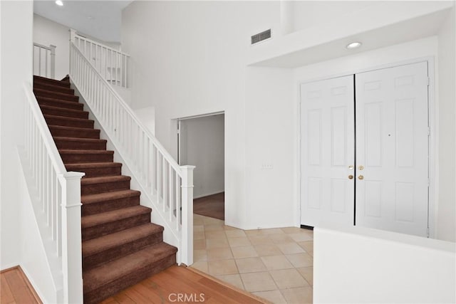 28403 Calex Dr, Valencia, CA 91354 - foyer featuring a towering ceiling, recessed lighting, and stairway
