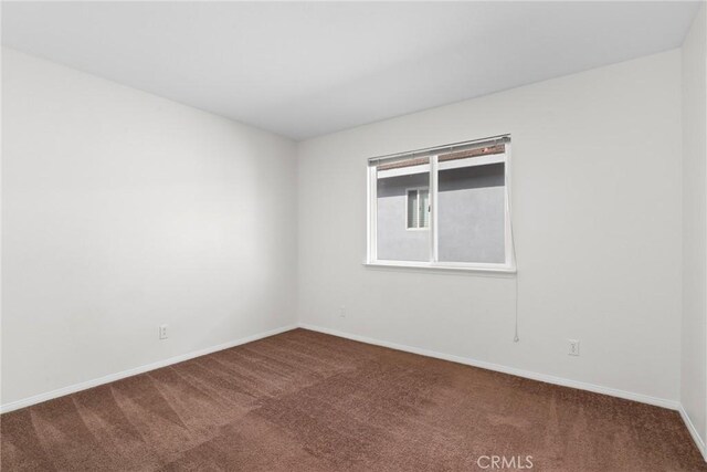28403 Calex Dr, Valencia, CA 91354 - empty room with dark colored carpet