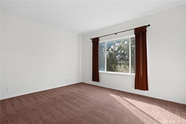 28403 Calex Dr, Valencia, CA 91354 - carpeted spare room with baseboards