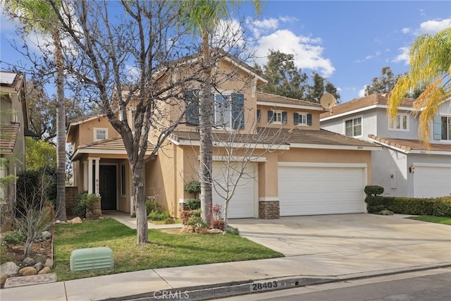 28403 Calex Dr, Valencia, CA 91354 - view of front of home with stucco siding, a garage, concrete driveway, a tile roof, and a front yard