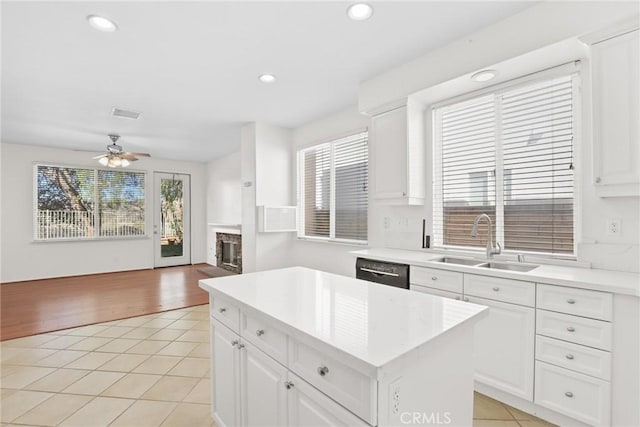 28403 Calex Dr, Valencia, CA 91354 - kitchen featuring light tile patterned flooring, dishwashing machine, a ceiling fan, light countertops, and recessed lighting