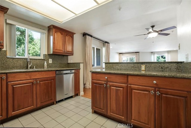 400 N 6th St Unit 202, Burbank, CA 91501 - kitchen featuring dishwasher, light tile patterned floors, a ceiling fan, tasteful backsplash, and plenty of natural light