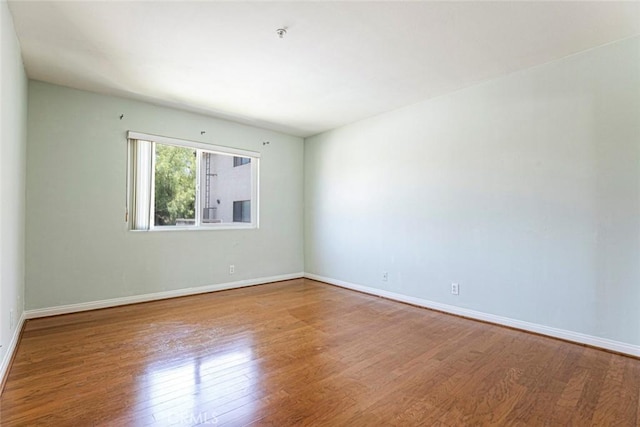 400 N 6th St Unit 202, Burbank, CA 91501 - unfurnished room with wood finished floors and baseboards