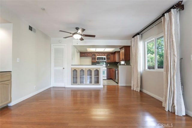 400 N 6th St Unit 202, Burbank, CA 91501 - unfurnished living room with a ceiling fan and light wood finished floors