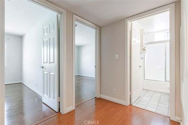 400 N 6th St Unit 202, Burbank, CA 91501 - hall with light wood-style flooring and baseboards