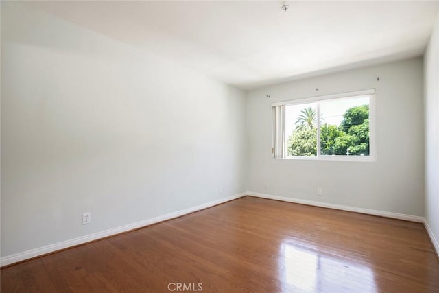 400 N 6th St Unit 202, Burbank, CA 91501 - unfurnished room with wood finished floors and a pendent fire sprinkler