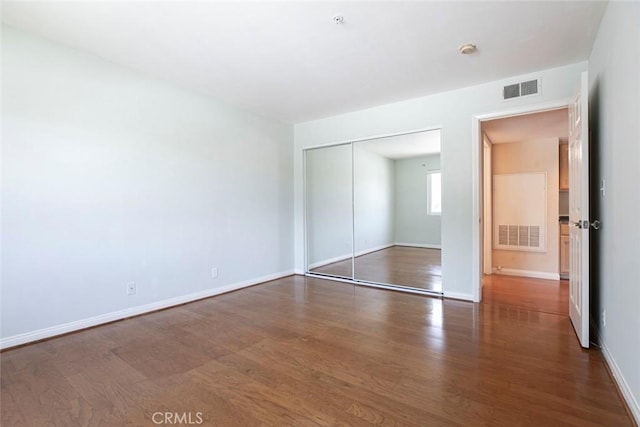 400 N 6th St Unit 202, Burbank, CA 91501 - unfurnished bedroom with wood finished floors and a closet