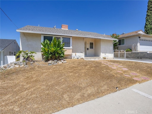 2623 N Parish Pl, Burbank, CA 91504 - ranch-style home featuring a chimney and stucco siding