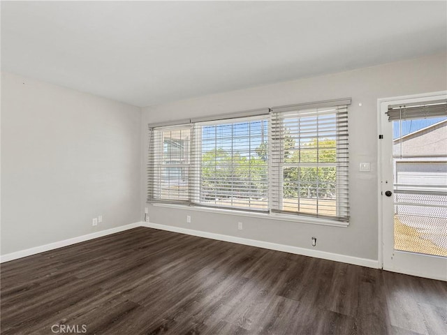 2623 N Parish Pl, Burbank, CA 91504 - spare room featuring plenty of natural light and dark wood-style floors