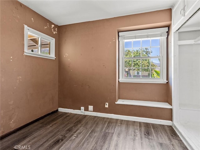 2623 N Parish Pl, Burbank, CA 91504 - empty room featuring wood finished floors and baseboards