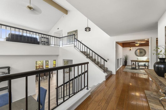 1471 Mercado, Escondido, CA 92026 - hallway featuring high vaulted ceiling, beam ceiling, hardwood / wood-style flooring, and stairs