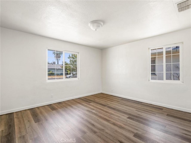 2135 Arden Dr W, Fresno, CA 93703 - unfurnished room with wood finished floors