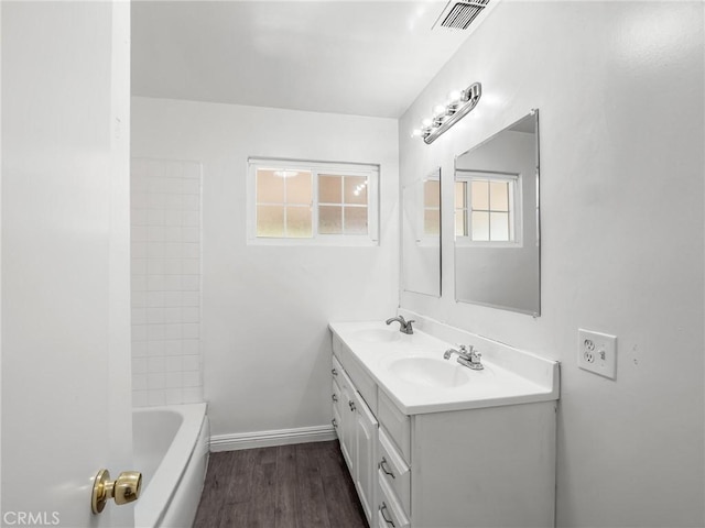 2135 Arden Dr W, Fresno, CA 93703 - full bath with double vanity and wood finished floors