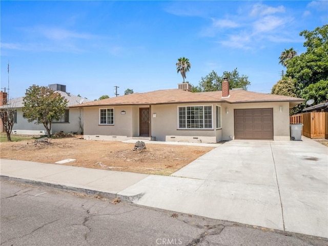 2135 Arden Dr W, Fresno, CA 93703 - single story home featuring an attached garage, driveway, stucco siding, a chimney, and crawl space