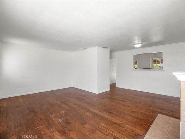 2135 Arden Dr W, Fresno, CA 93703 - spare room with hardwood / wood-style floors and baseboards