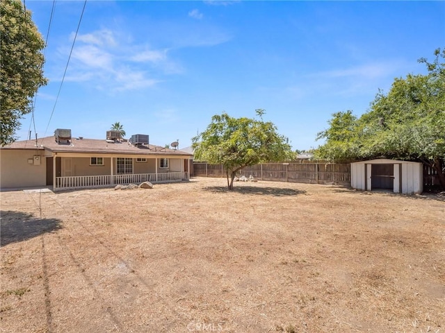 2135 Arden Dr W, Fresno, CA 93703 - fenced backyard featuring a shed
