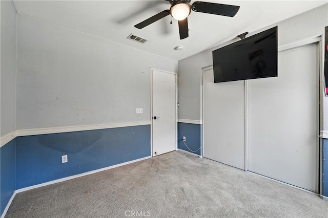 23885 Cheyenne Canyon Dr, Menifee, CA 92587 - unfurnished bedroom with carpet flooring, a closet, and a ceiling fan