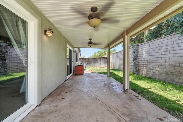 23885 Cheyenne Canyon Dr, Menifee, CA 92587 - fenced backyard featuring a patio and ceiling fan