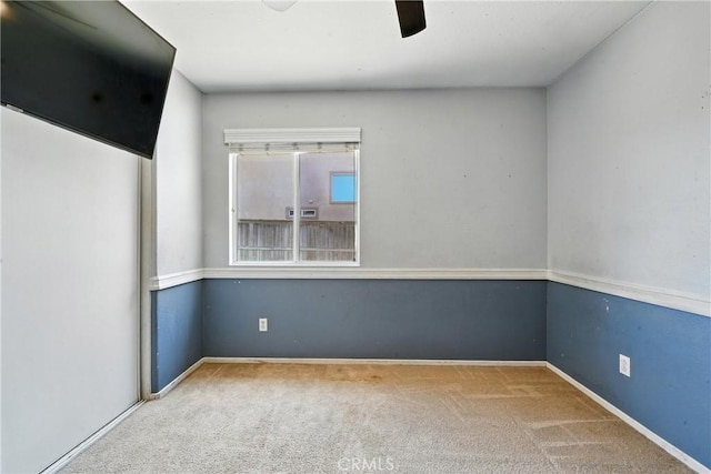 23885 Cheyenne Canyon Dr, Menifee, CA 92587 - carpeted spare room featuring baseboards and a ceiling fan