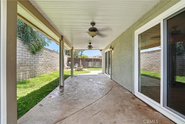 23885 Cheyenne Canyon Dr, Menifee, CA 92587 - fenced backyard featuring a patio and a ceiling fan